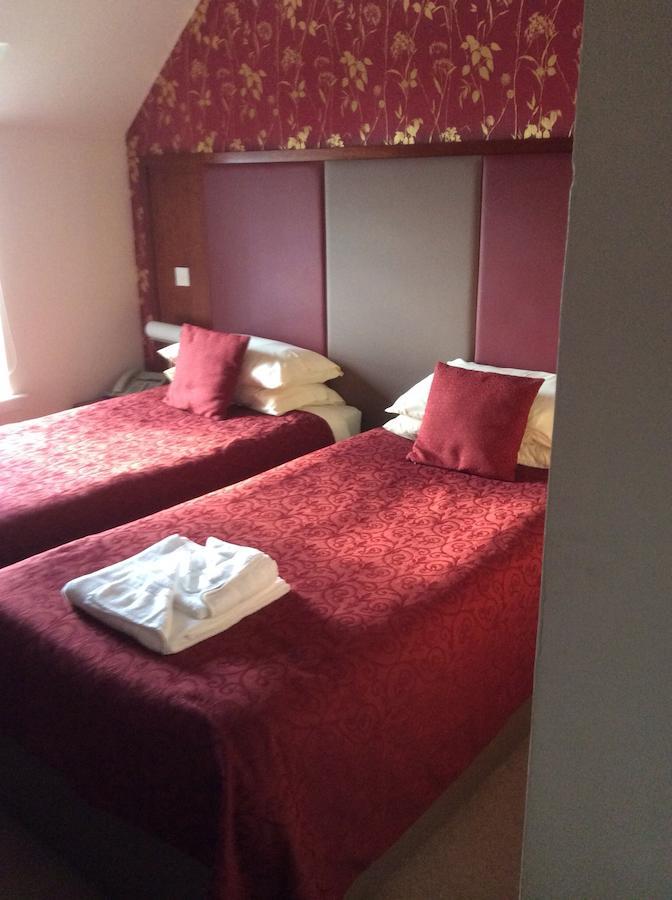 Polochar Inn Pollachara Pokoj fotografie